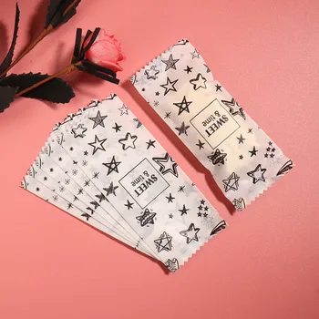 

100pcs/lot Nougat Wrapping Handmade Bakery Candy Bag Black White Pattern Stars Wedding Party DIY Plastic Sugar Bonbon Gift Bags