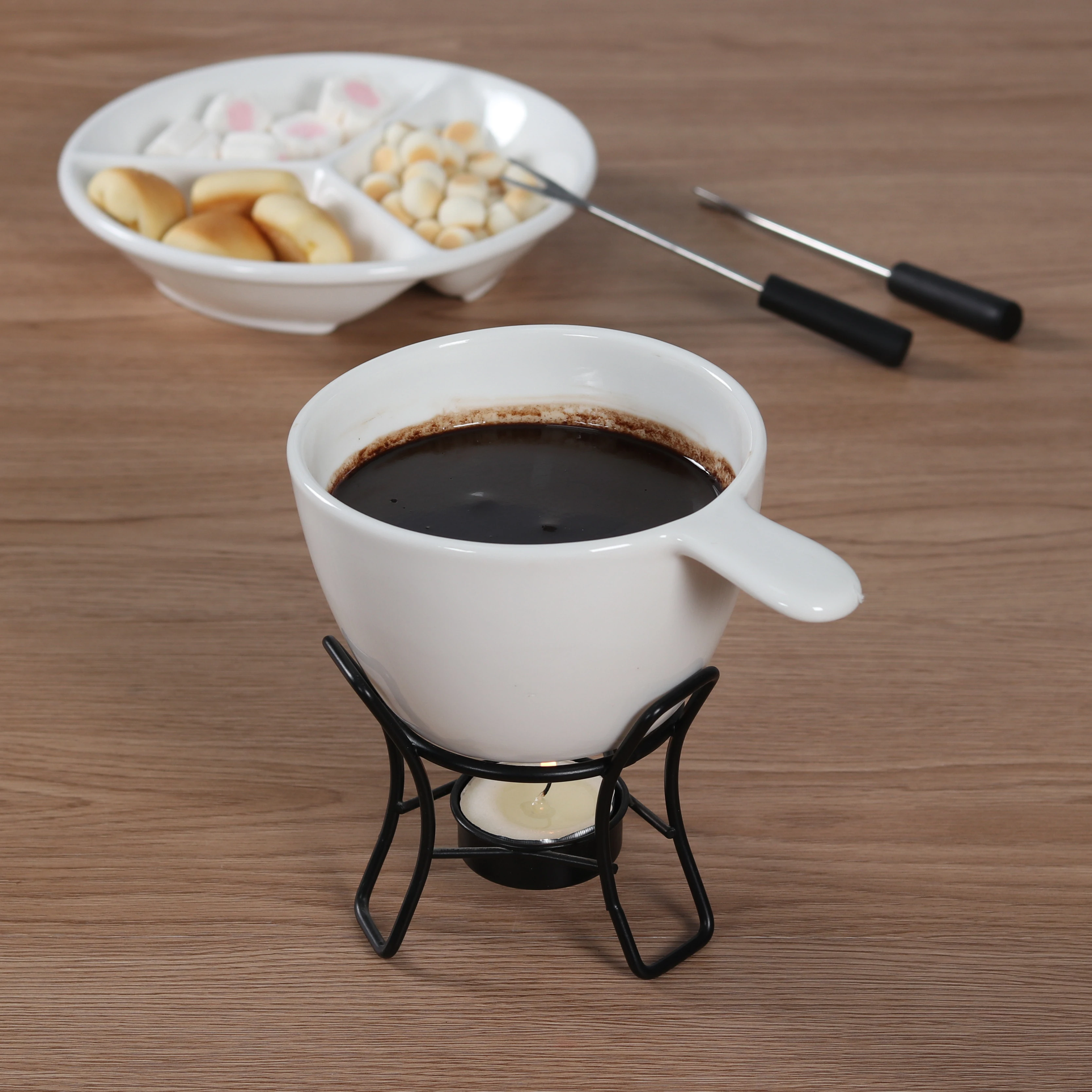 Ceramic chocolate melting bowl with handle, metal stand and tealight