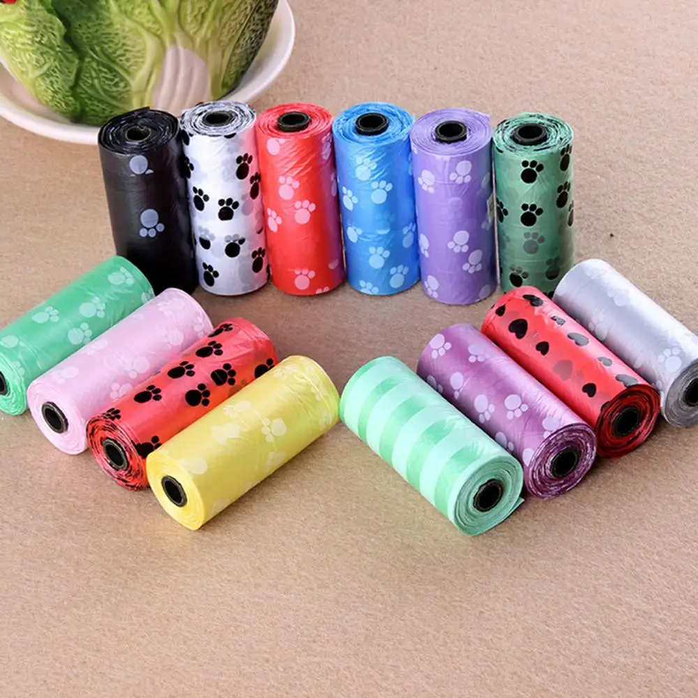 1PC/rollo, suministros para mascotas perro residuos Bolsa para popó con impresión bolsa recoger aguafiestas bolsos Color aleatorio