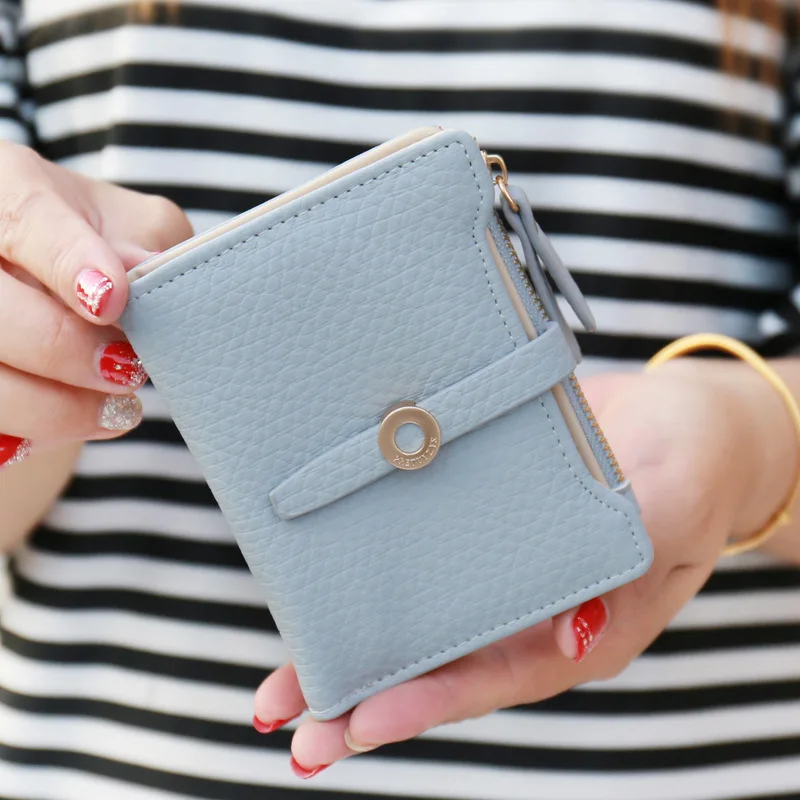 

Japanese and Korean version of mini ultra-thin wallet female short lychee pattern two folding simple buckle student wallet