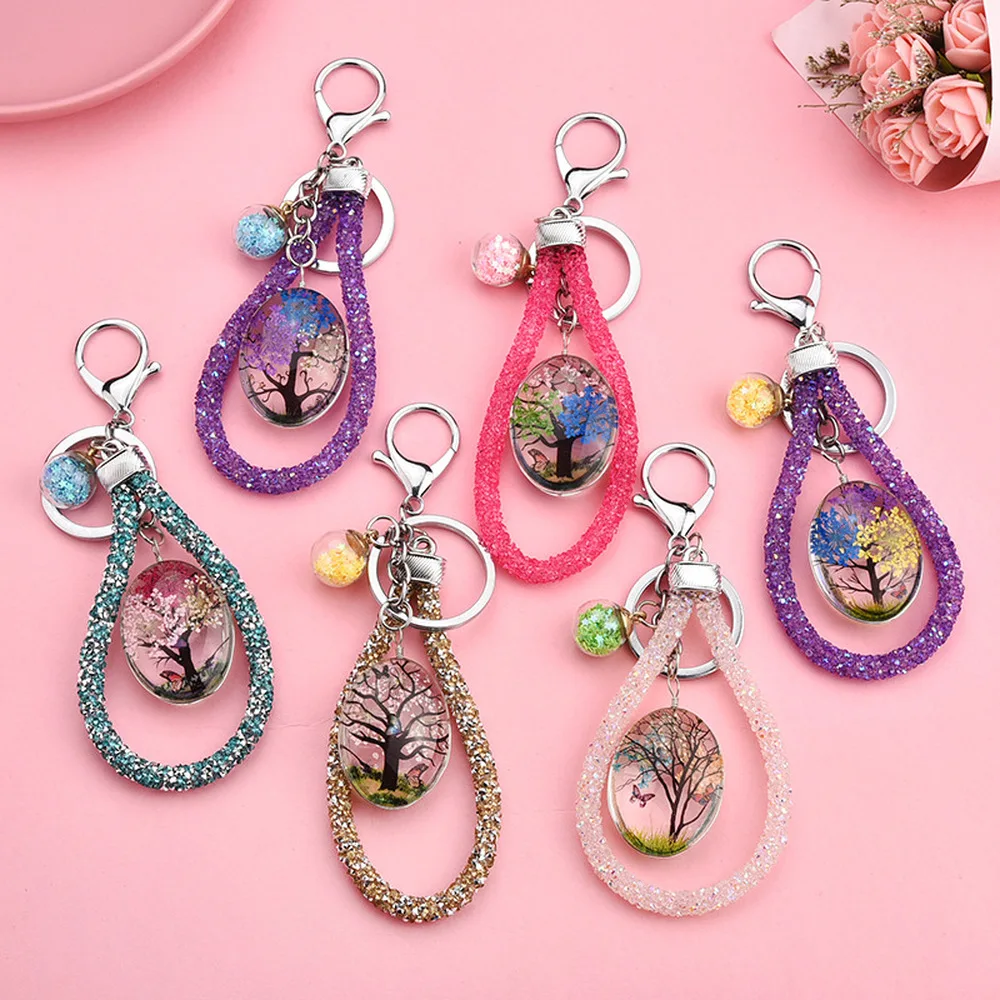 

Hot sale breath dried flower plant Butterfly Keychain bag accessories time gem handmade glass pendant Zinc Alloy key chains