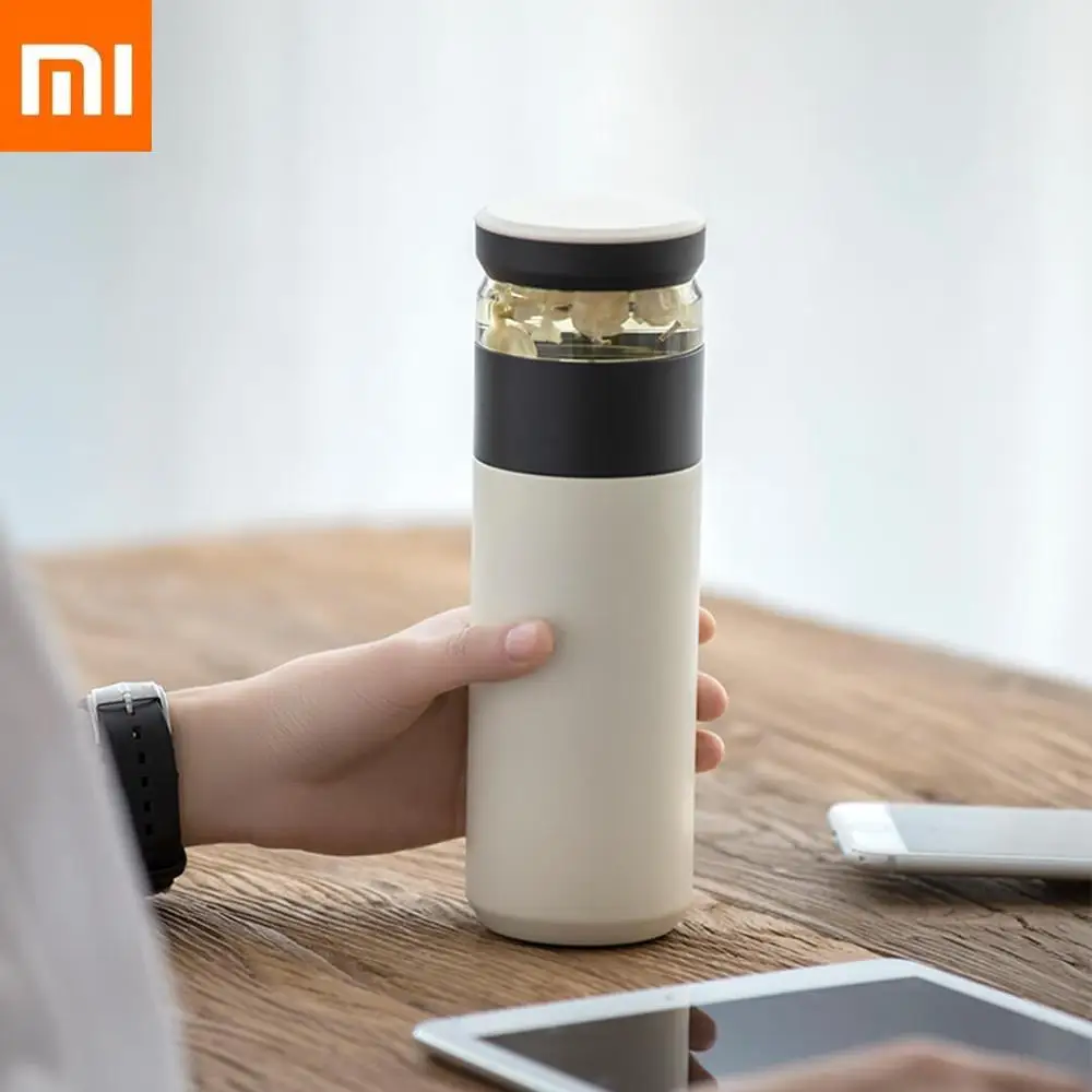 Baratos Xiaomi divertido portátil de vacío de agua de 520ml copa de viajes al aire libre de té de separación de agua botella caliente grado taza PP Thermas