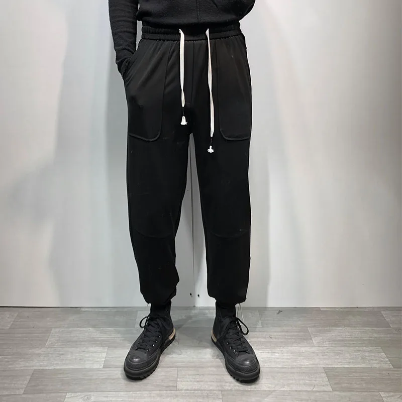 

Men's new classic contracted day is tied to draw rope waist design youth fashion joker casual loose large size harun pants