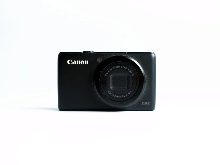 USED Canon PowerShot S95 10 MP Digital Camera with 3.8x Wide Angle Optical Image Stabilized Zoom and 3.0-Inch LCD