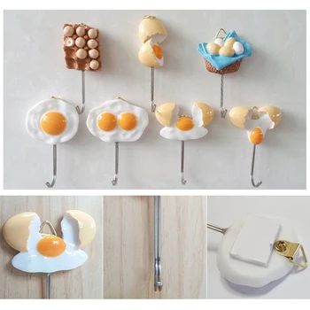 

Waterproof without Traces Wall Hooks for Kitchen Strong Adhesive Shelf Resin Egg Shape Free Punching Sticky Hanger TXTB1