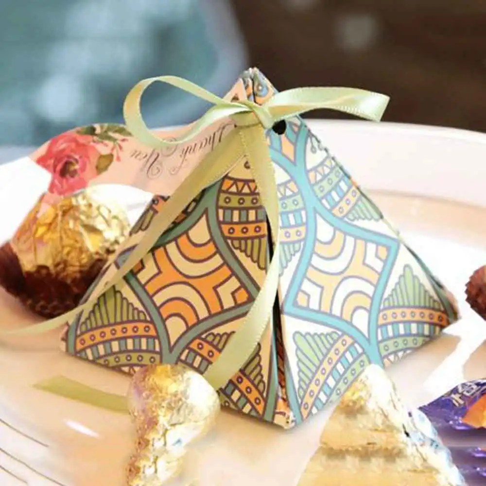 

Free shipping 50pcs Creative Candy Box Baby Shower Favors Triangular Pyramid Wedding Favors Gifts Box Bomboniera Party Supplies