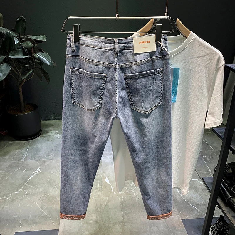 Ripped Denim jeans men's trendy brand loose summer thin elastic feet pants men's Korean harem teenagers cropped pants