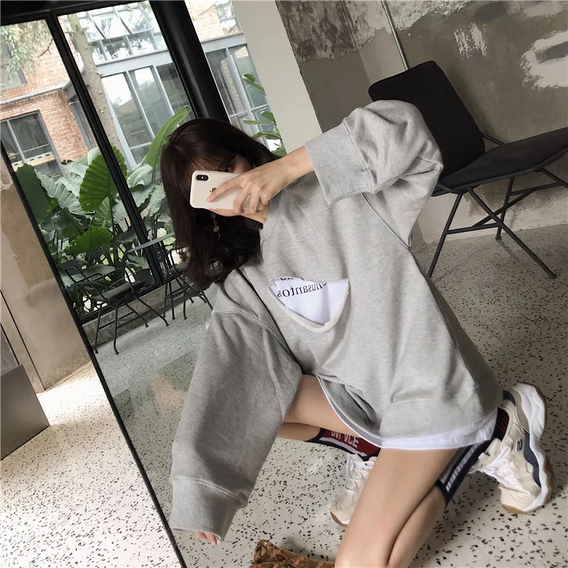 female autumn new fake two pieces of irregular hip hop tide street loose Korean bf wind student lantern sleeve