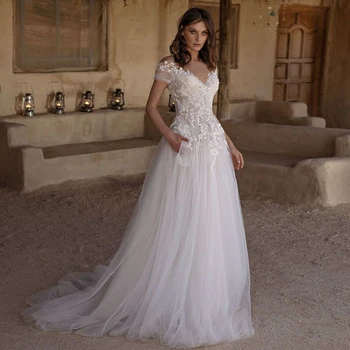 

A-line Wedding Gowns 2020 Charming Sheer O-neck Appliques Beading Sweep Train Short Sleeve Tulle Bridal Dresses