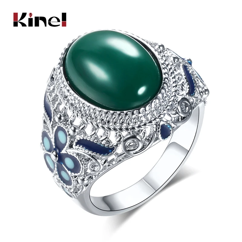 Женское кольцо с зеленым камнем Kinel серебряное голубым цветком вечерние