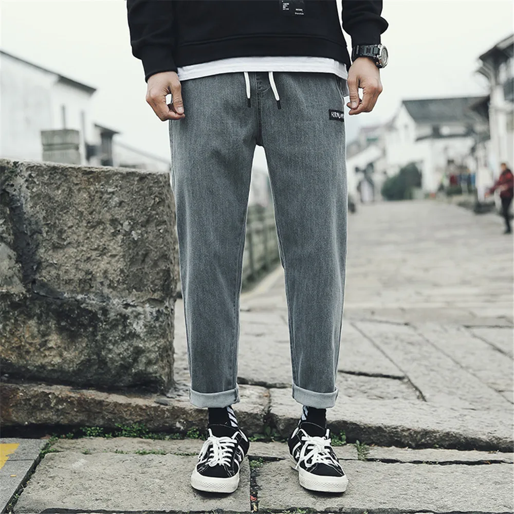 Gray WWKK Men's New Autumn Sweatpant Letter Jeans Fashion Solid Color Trousers Men Wide Leg Sport Pants Male Elastic Stretchy Joggers - Цвет: Gray