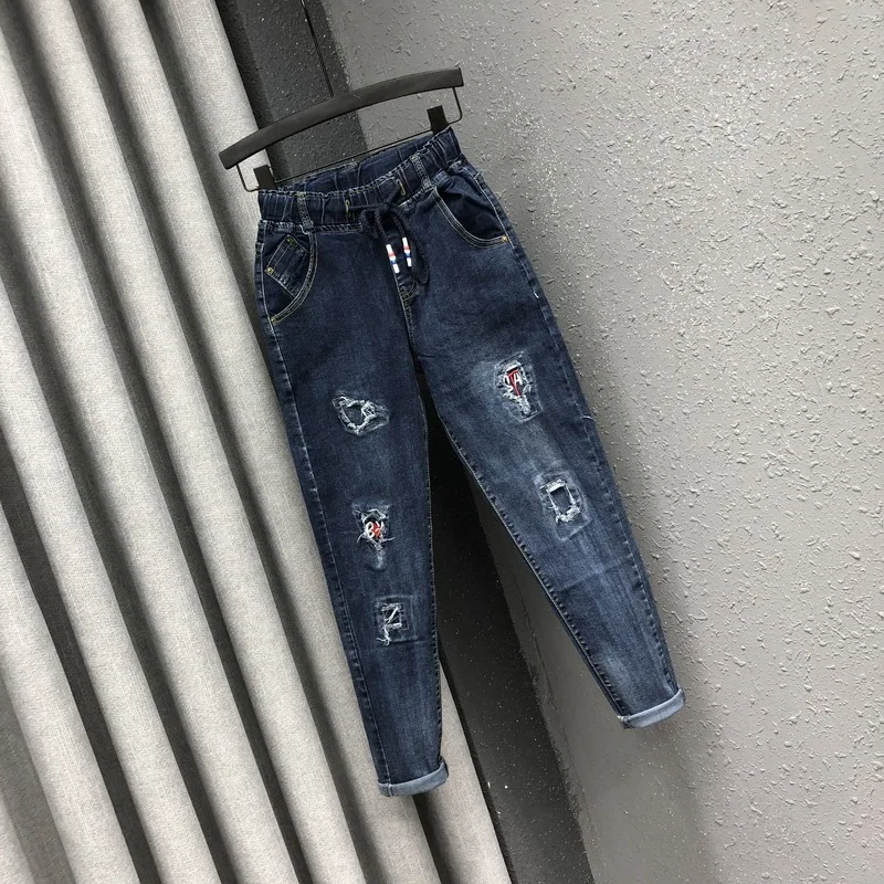 hole Personality patch patch pants women spring and autumn new Korean version of the slim loose harem pants
