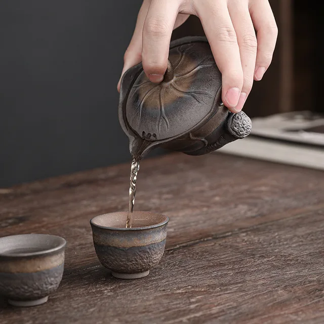 Lotus Leaf Hand-Held Pot Old Rock Mud Gilt Iron Glaze Kung Fu Tea Set