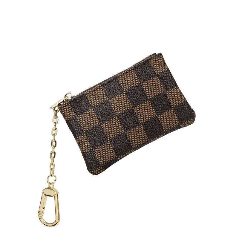 

2019 new famous brand Short Men and Women Wallet Lady Small Bag Zipper Hand Holding top quality Bag Simple Mini wallet luxury
