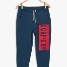 Koton kids/синие спортивные штаны с принтом для мальчиков