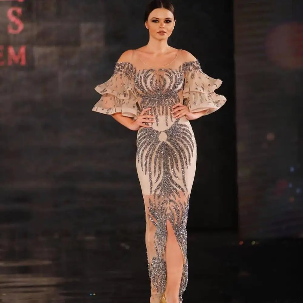 

Sparkly Luxurious Crystals Evening Dresses Champagne Sheer Neck Beaded Prom Dresses Sheath Formal Party Pageant Gowns
