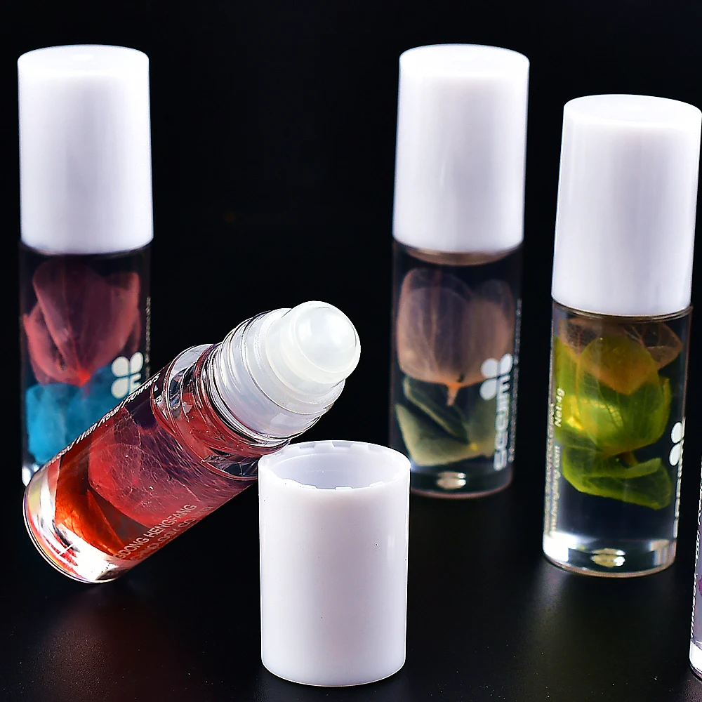 

1pc at random color Lipstick Lips Nutritious Lip Oil Roller Ball Dried Flowers Lip Essence Moisturizing Shiny Lip Gloss T0677