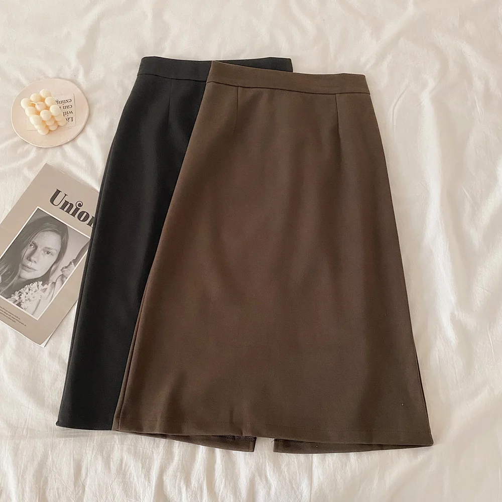 

and winter design sense niche 2021 new women's black high waist thin covering crotch medium and long A-line skirt
