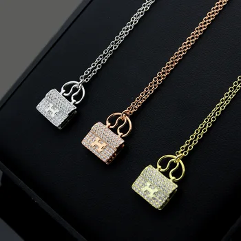 

Wholesale Titanium steel H letter bag full of diamond necklace lady bag with diamond neck chain