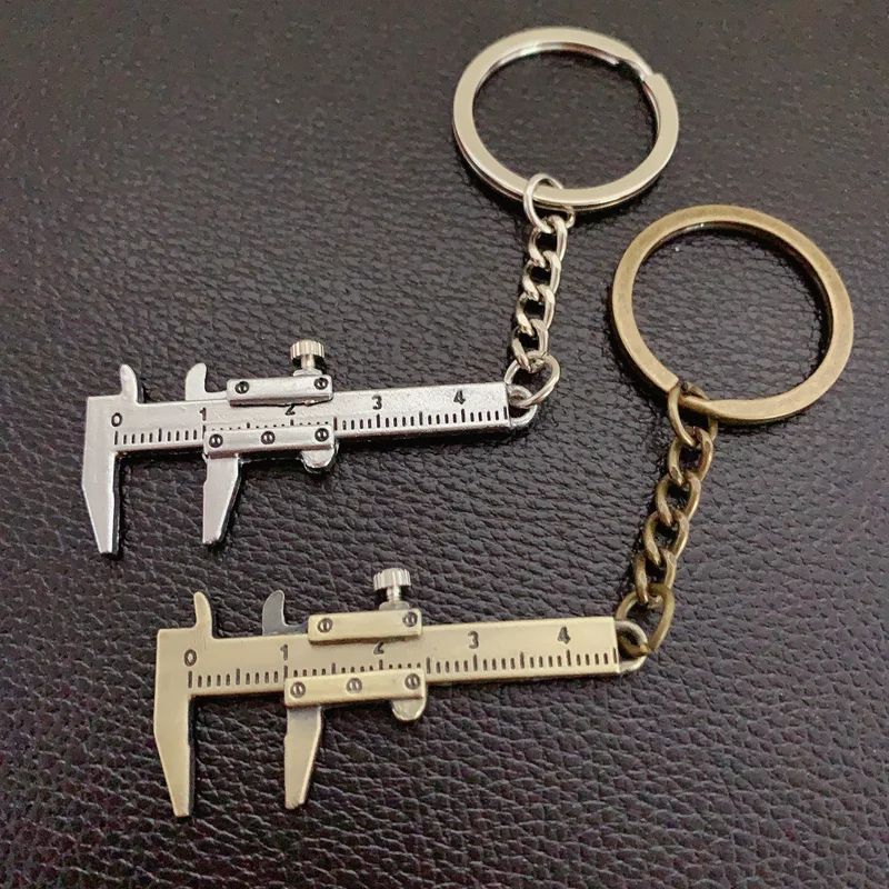 Buena Compra LLavero de Calibre Vernier portátil, Mini calibrador Vernier de 0-4cm, estilo de llavero, regla modelo de simulación, calibrador Vernier 1gNWbO7Vqy8