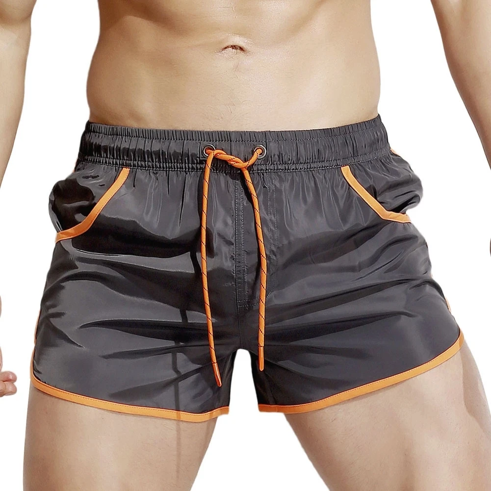 New Men's Waterproof Running Fitness Three-point Pocket Shorts Sexy Fashion Beach Pants
