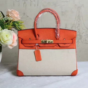 

Canvas stitching with cowhide fashion buckle bag Portable Single Shoulder Messenger Bag