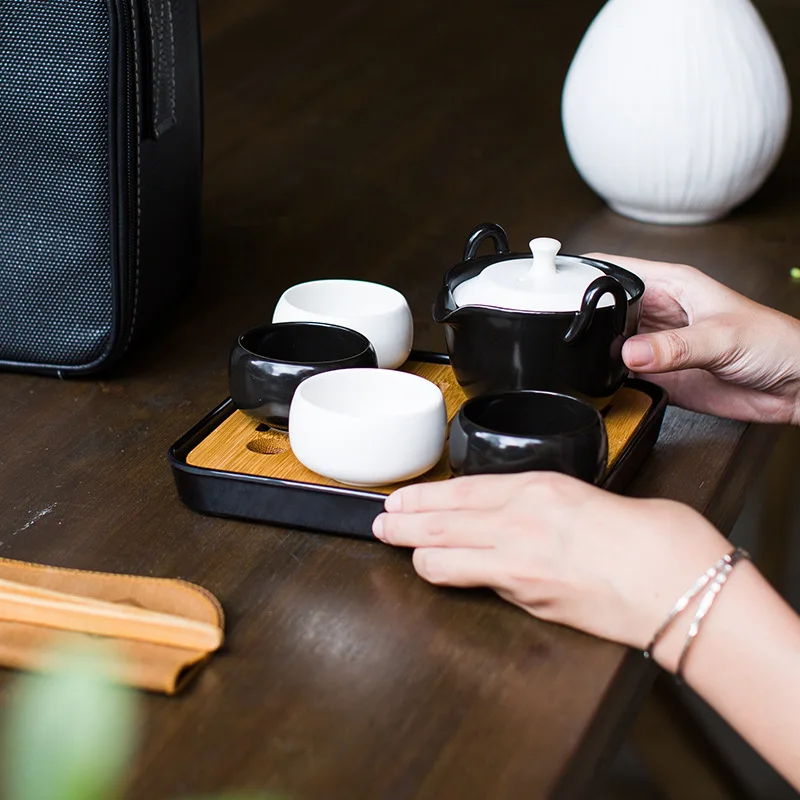 

Fang ran Travel Tea Set Ding Japanese Style Pot a Pot of Four Cup Can Be Printed Logo Customizable Gift Wholesale