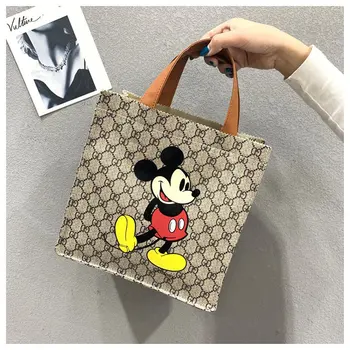 

2019 new Disney fashion trend handbags casual small bag mickey mouse portable canvas bag handcuffs bag lunch box bag