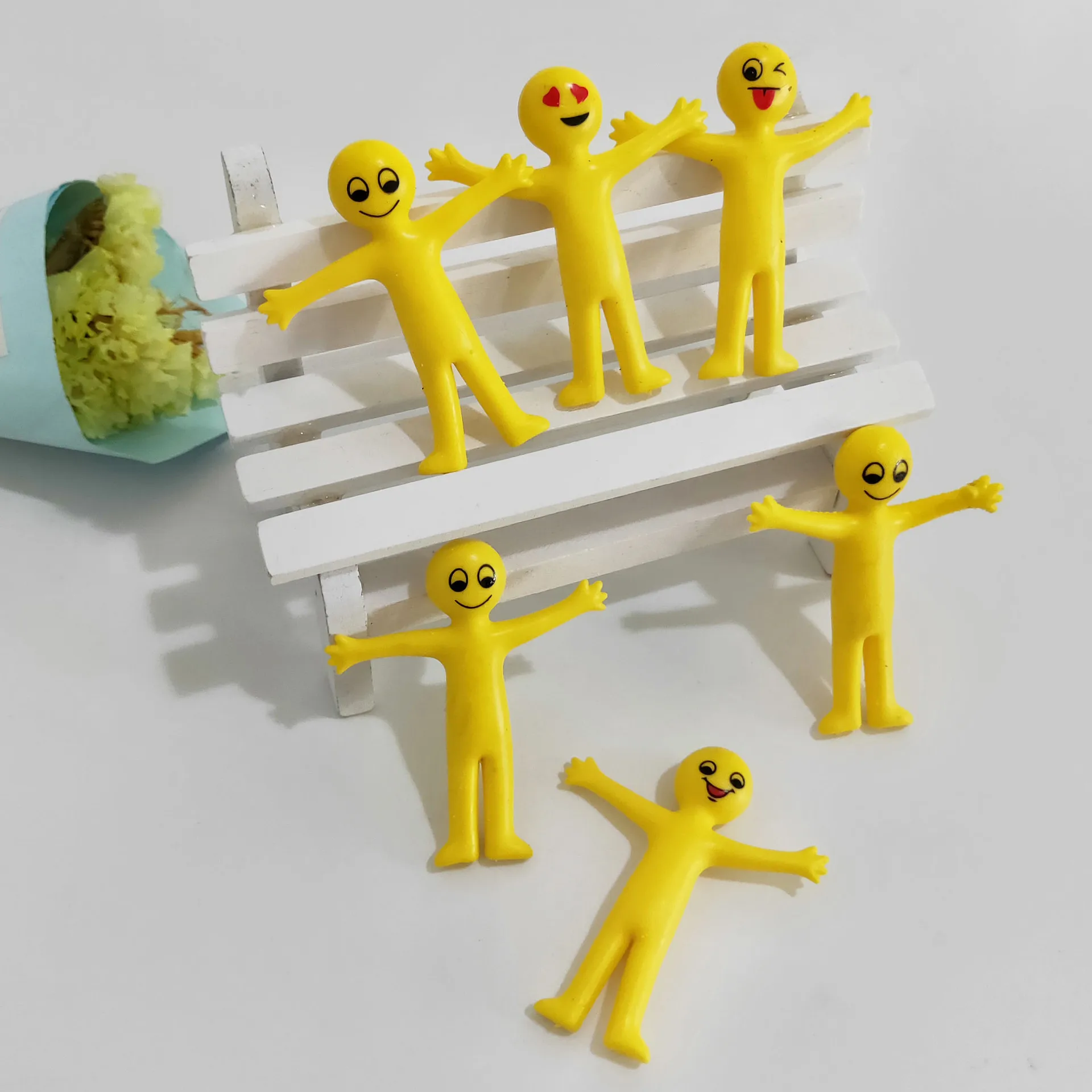 

12pcs/Batch Pressure Extrusion Novelty TPR Soft Gel Pressure Reducing Toys for Little Dolls with Yellow Man's Facial Expression
