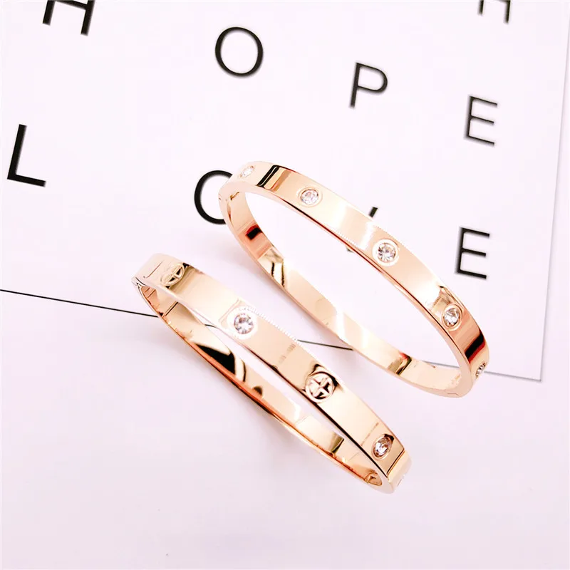 Korean-style Korean style stainless steel love bracelet COUPLE'S Eternal Ring cross pattern buckle full of crystals titanium ste