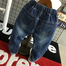 Детские джинсы; коллекция года; осенние свободные ковбойские длинные штаны для маленьких мальчиков со смайликами и дырками