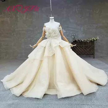 

AXJFU luxury princess beading crystal flower champagne lace wedding dress vintage boat neck bride big bow wedding dress 2404
