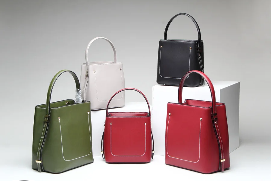 

Tide Quality Head Layer Cowhide Concise Handbag Single Shoulder Span Bucket Package Woman Package
