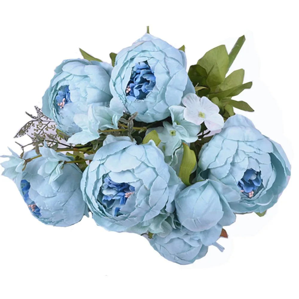 Dining room table decorated false flowers core peony peony flower shape