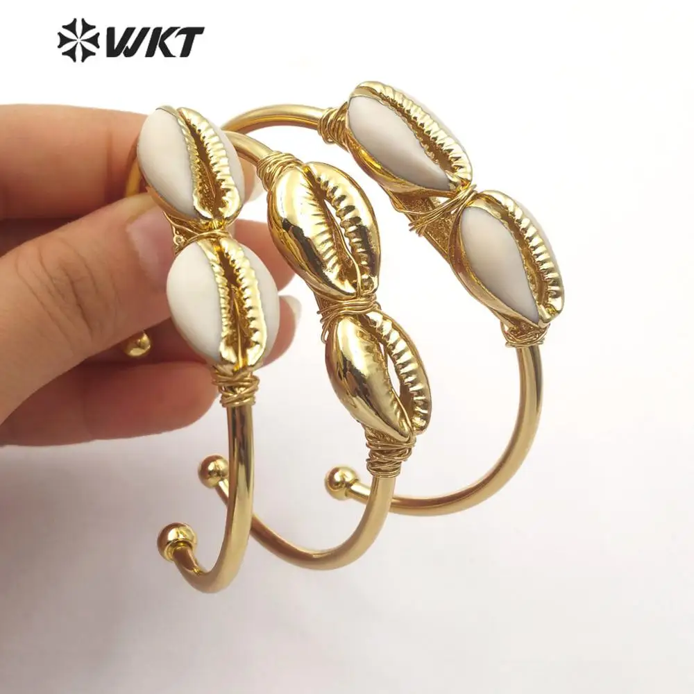 

WT-B487 Natural Cowrie Shell Wire Wrapped Bracelet Double Gold Trim Cowrie Full Gold Electroplated Bangle Fashion Jewelry
