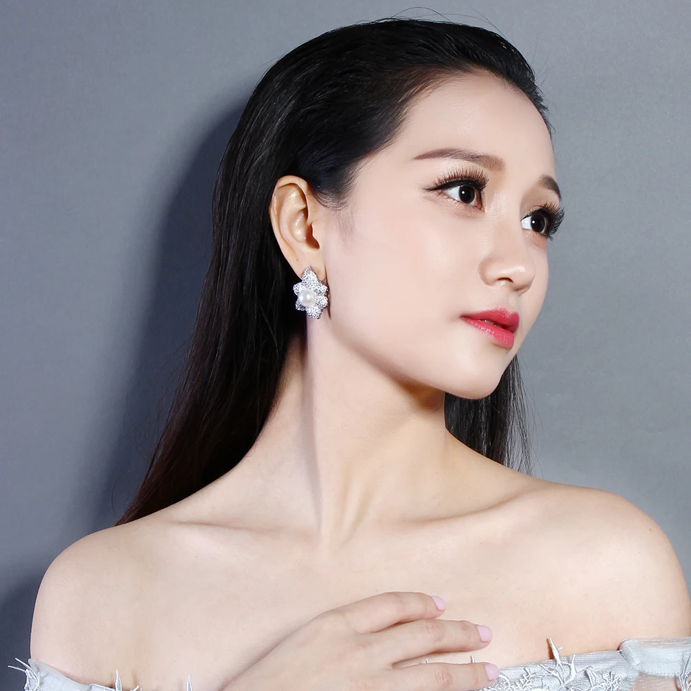 white pearl earrings
