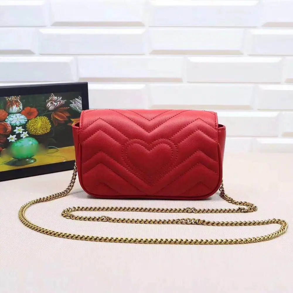 

NEW Genuine Leather Female Cow Skin Handbags Peach Heart Wavy Chain with A Single Shoulder Slanting Clutch Simple Mini Women Bag