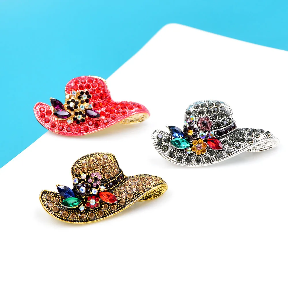 Broche vintage soleil anémone métal doré et strass Carven