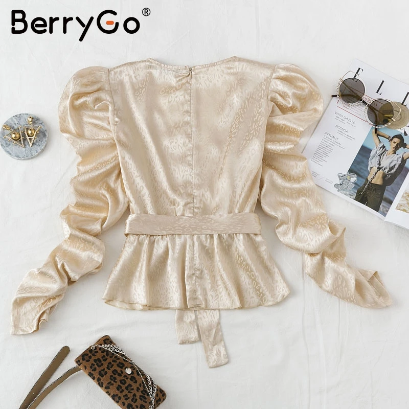 BerryGo Sexy Autumn winter puff sleeve sash belt female blouses shirts Sexy v-neck printed women blouse Elegant party ladies top