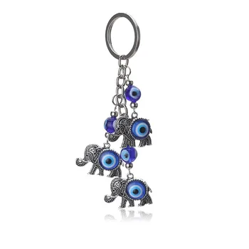 

1PC Blue Evil Eye Charms Keychain Three Elephants Shape Pendent Key Chain Alloy Tassel Car Key Chain Fashion Jewelry Gifts