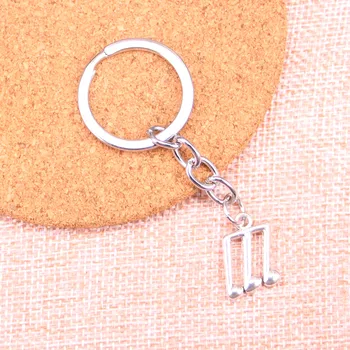 

20pcs musical note Keychain 18*14mm Pendants Car Key Chain Ring Holder Keyring Souvenir Jewelry Gift