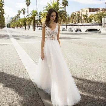 

Sexy V Neck Sleeveless Wedding Dress Boho Lace Applique Backless Illusion A-line Tulle Bridal Wedding Gowns Robe Mariee