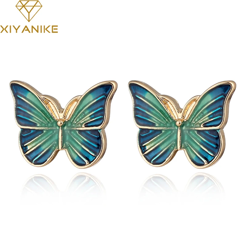 

XIYANIKE Blue Dripping Oil Simulation Butterfly Stud Earrings Gold Color Metal Butterfly Piercing Earrings Elegant Women Jewelry