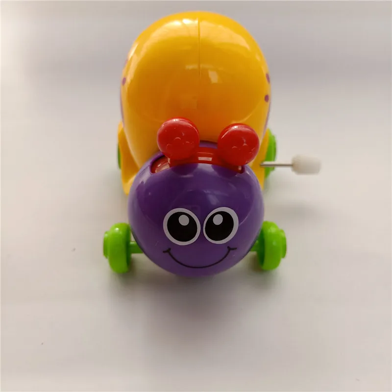 1 шт. мультфильм улитка заводная игрушка мини-забавная игрушка для мальчиков и девочек головоломка подарок поставка Размер 8*8*6,5 см HANDANWEIRAN