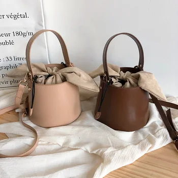 

2020 new women's handbag trend simple retro bucket bag fashion wild solid color ladies shoulder Messenger bag girl cute handbag