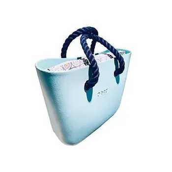 

Obag mini bag mounted with turquoise carrycot and rope handles navy blue