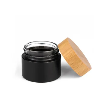 

Bamboo eco friendly lotion container 30ml 50ml 100ml bamboo cosmetic packaging face cream black glass jars with bamboo wood lid