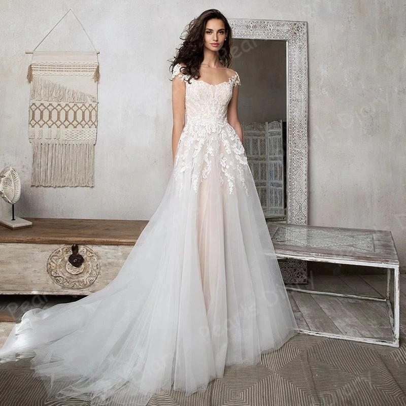 Charmming-A-line-Wedding-Gowns-2020-Sheer-O-neck-Cap-Sleeve-Sweep-Train-Lace-Applique-Bridal.jpg_Q90.jpg_.webp