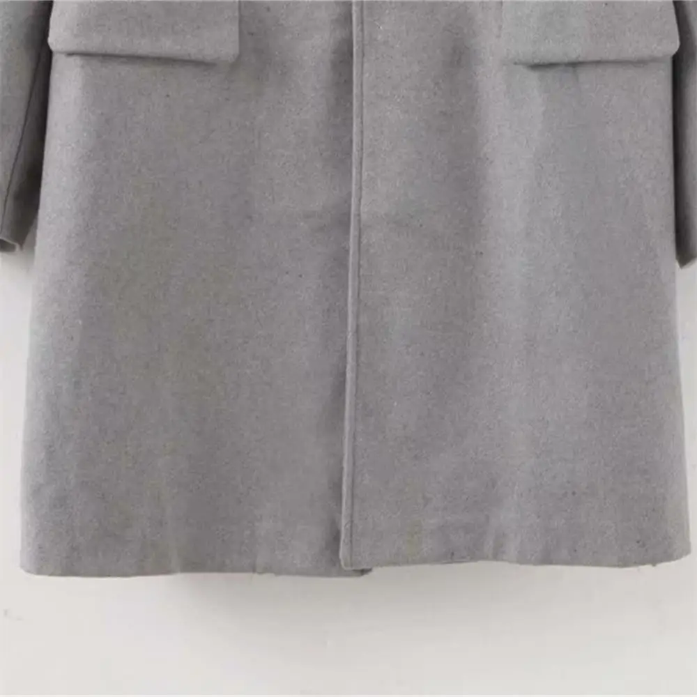 Женское пальто с отложным воротником длинным рукавом карманом и разрезом сзади