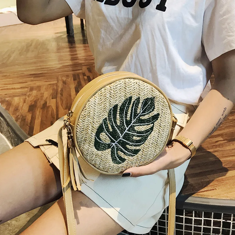 

2018 Autumn New Style Pineapple Embroidery Small Circle Bag Versatile Shoulder Oblique Straw WOMEN'S Bag Tassel Bag